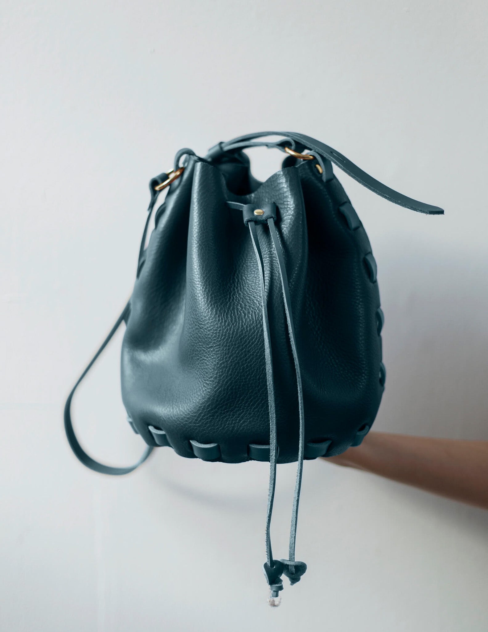 dark-green-leather-bucket-bag