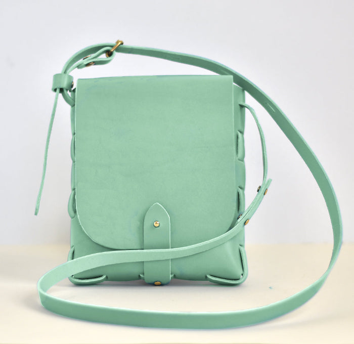 Stitchless leather mini bag in mint, made from a downloadable PDF pattern — no sewing machine needed