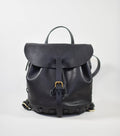 Black leather backpack on a white background