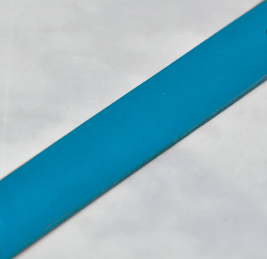 close up of blue leather veg tan strap