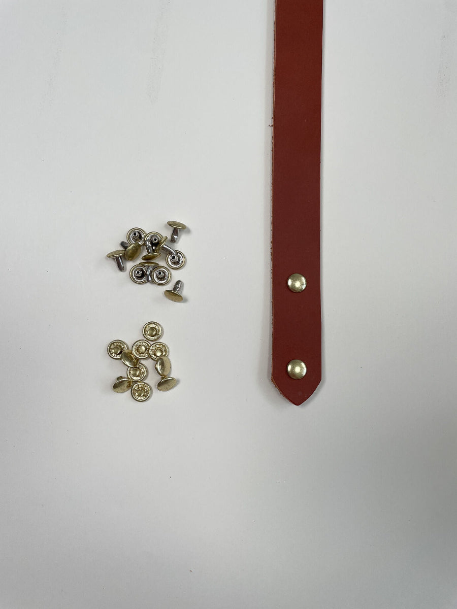 close up of brown leather strap with rivets for bag makers