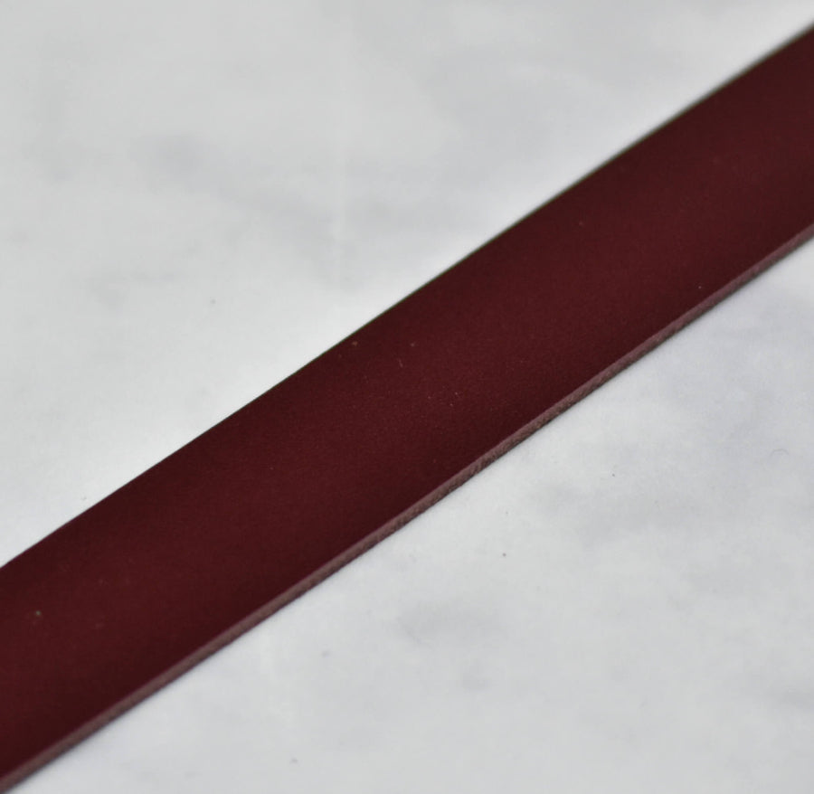 close up of burgandy veg tan leather strap for makers 