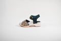 cheetah print and dark green leather and wood sandal made from a luxury shoe making kit