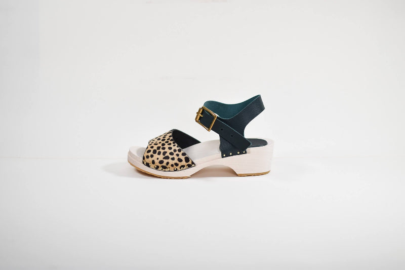 cheetah print and dark green leather and wood sandal made from a luxury shoe making kit