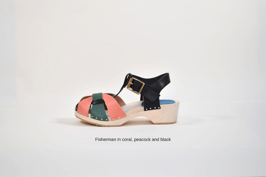 colourful wooden clog made from a shoe kit on white background