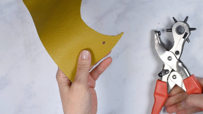 Essential tool - a hole punch