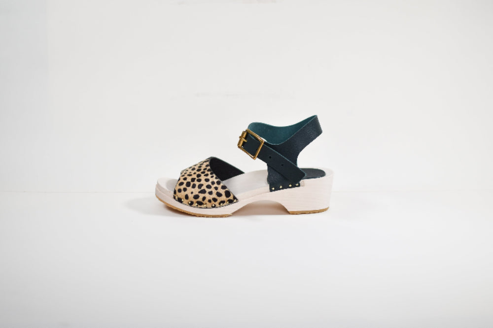cheetah print and dark green leather and wood sandal made from a luxury shoe making kit