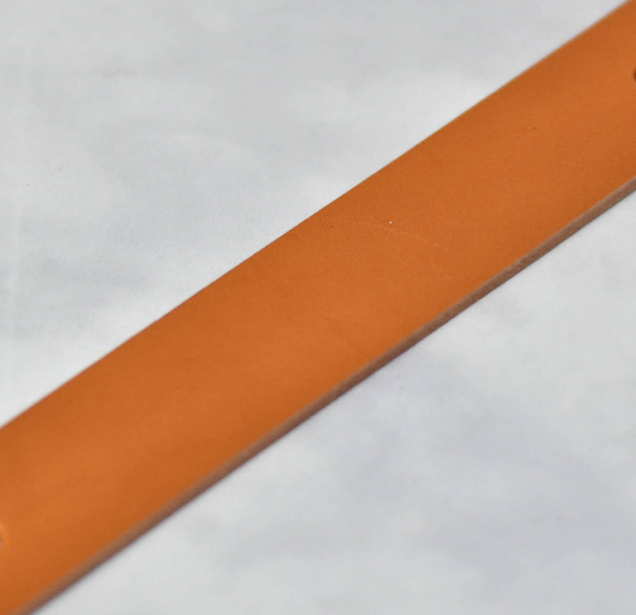 close up of light tan leather strap veg tan 