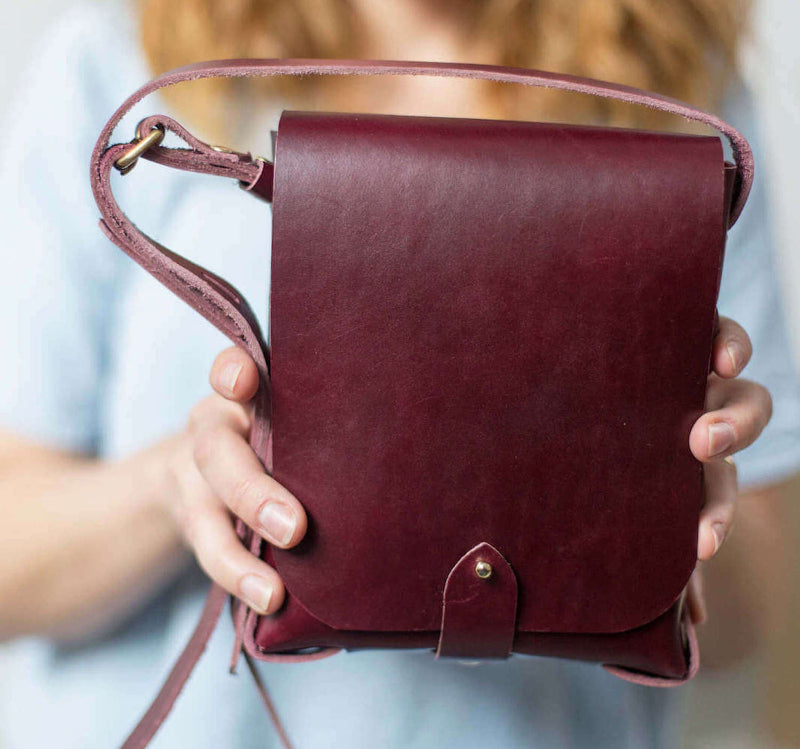 Handmade oxblood leather mini cross body bag made from the Leather Needle Thread stitchless mini bag pattern