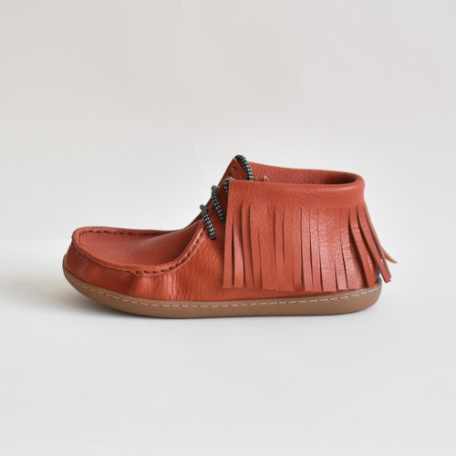 rust leather fringed boot  on a white background