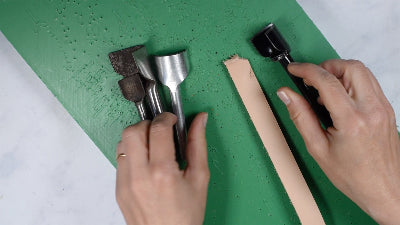 Optional tool - a strap end punch