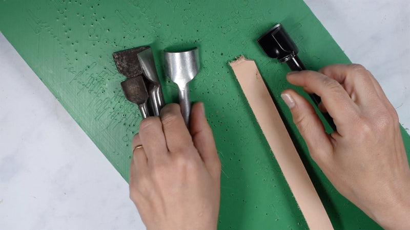 Optional tool - a strap end punch