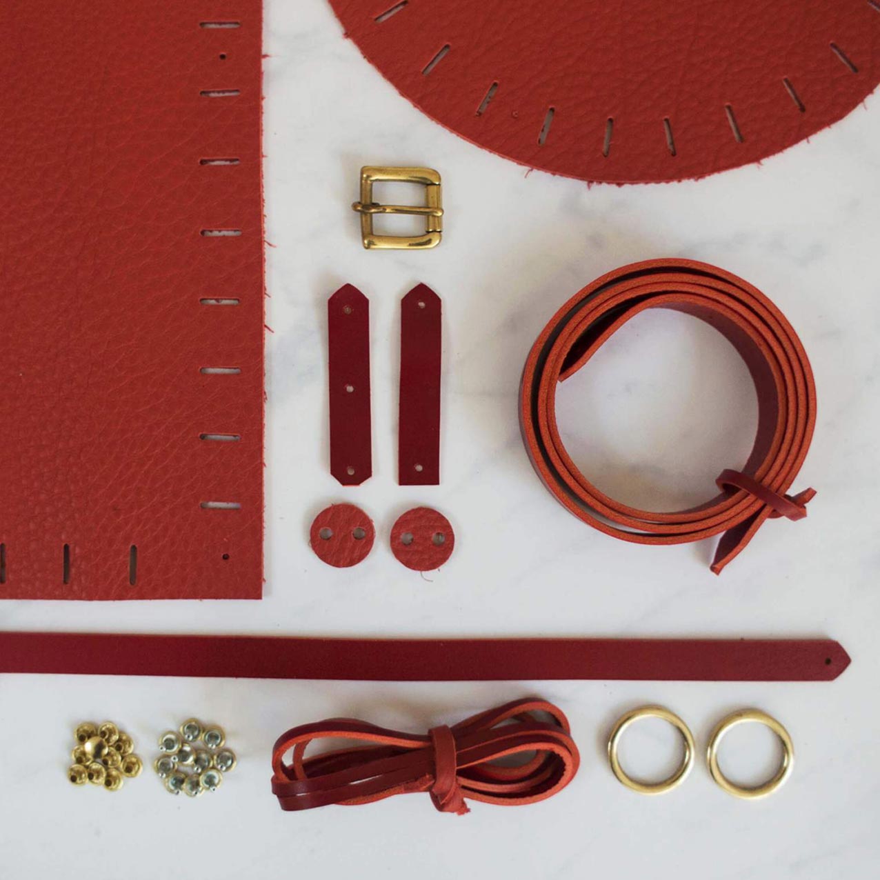 leather-backpack-making-kit-contents-laid-out
