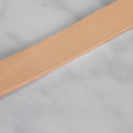 close up of natural veg tan leather strap 